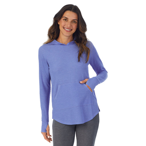 Ultramarine Heather; Model is wearing size S. She is 5’9”, Bust 34”, Waist 25.5”, Hips 36.5”. @A lady wearing a Ultramarine Heatherlong sleeve hoodie tunic.