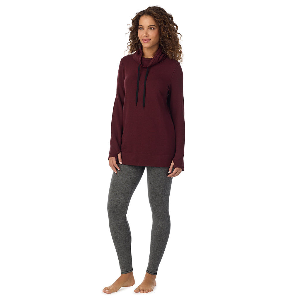  A Lady is wearing a Cabernet Heather Ultra Cozy Long Sleeve Cowl Neck Tunic