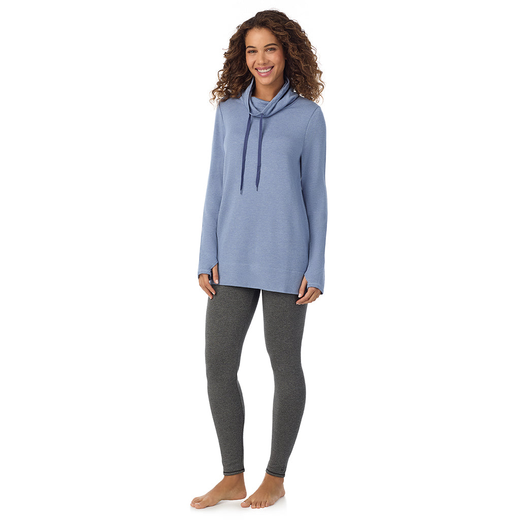 Smoke Blue Heather; Model is wearing size S. She is 5’9”, Bust 34”, Waist 23”, Hips 35”@ A Lady is wearing a Smoke Blue Heather Ultra Cozy Long Sleeve Cowl Neck Tunic