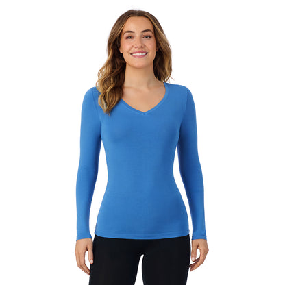 Blue Comet; Model is wearing size S. She is 5'11.5", Bust 34", Waist 26", Hips 37".@A lady wearing blue comet long sleeve  softwear with stretch v-neck.