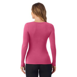 A lady wearing very berry long sleeve v-neck tall softwear with stretch top.