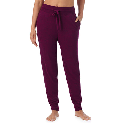 Marled Dark Purple; Model is wearing size S. She is 5'8", Bust 34", Waist 24.5", Hips 35".@ A Lady is wearing Marled Dark Purple Soft Knit Jogger