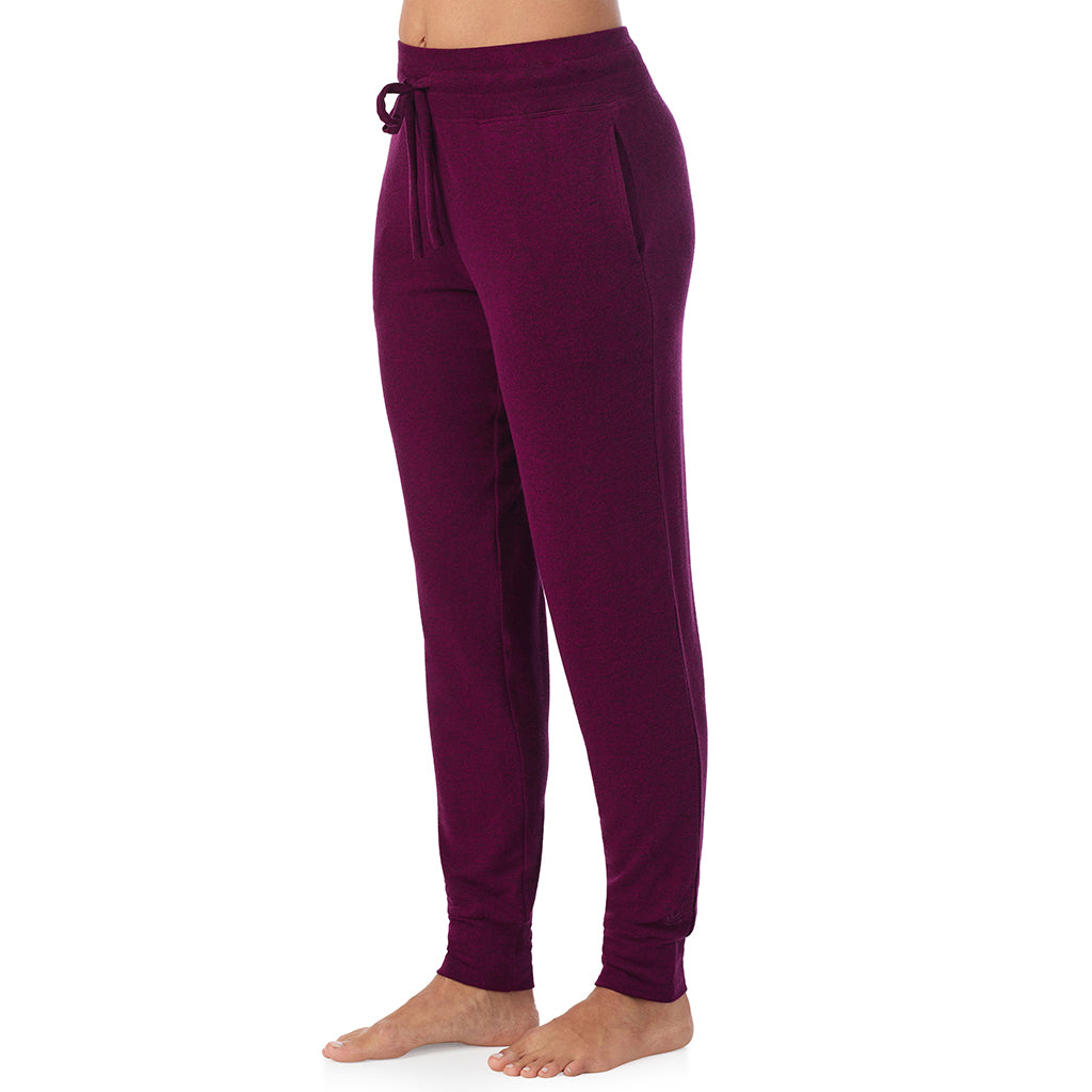 Marled Dark Purple; Model is wearing size S. She is 5'8", Bust 34", Waist 24.5", Hips 35".@ A Lady is wearing Marled Dark Purple Soft Knit Jogger