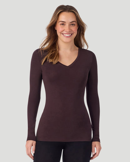 A lady wearing Softwear With Stretch Long Sleeve V-Neck in Mahogany
