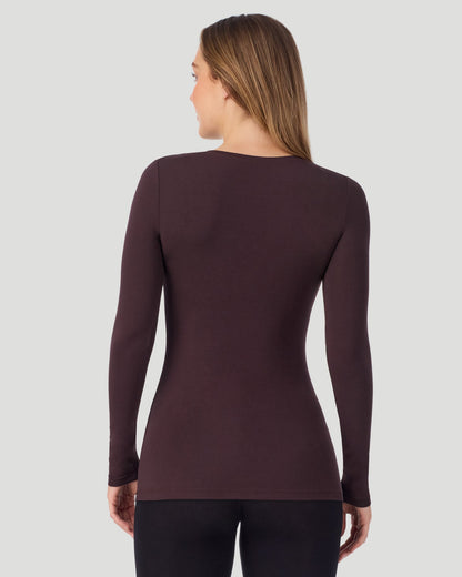A lady wearing Softwear With Stretch Long Sleeve V-Neck in Mahogany