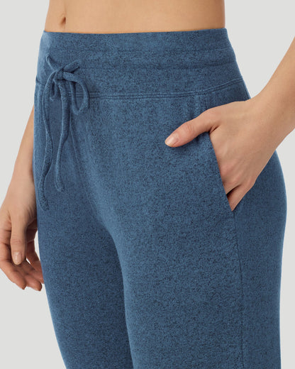  A Lady is wearing Deep Chambray SoftKnit Jogger in a front view closer look