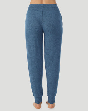  A Lady is wearing Deep Chambray SoftKnit Jogger in a back view look