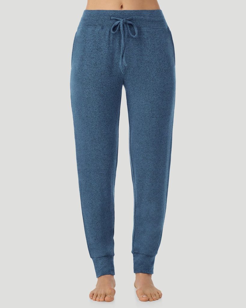  A Lady is wearing Deep Chambray SoftKnit Jogger in a front view look
