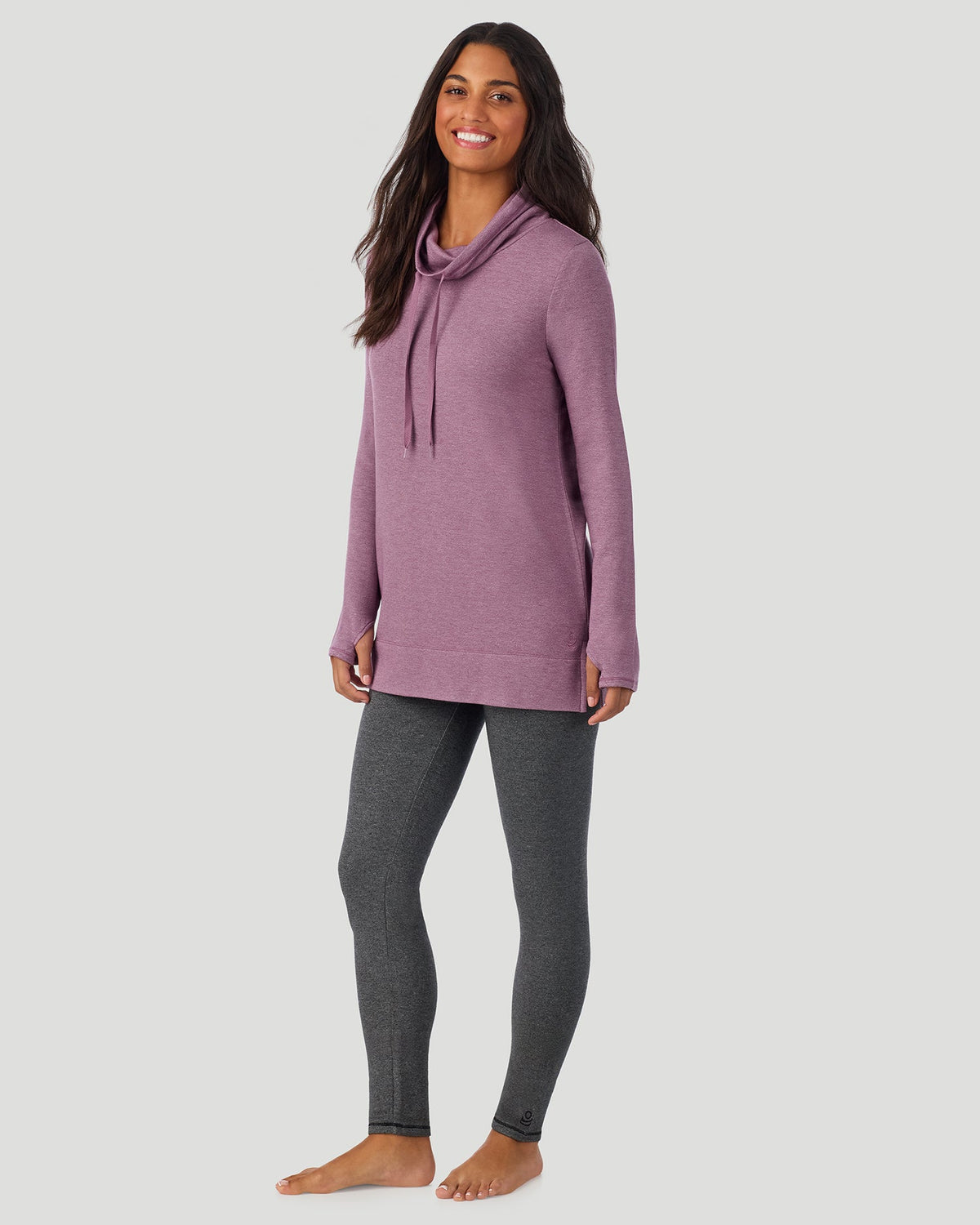 Dark Amethyst; Model is wearing size S. She is 5’9”, Bust 34”, Waist 23”, Hips 35”@ A Lady is wearing a Dark Amethyst Ultra Cozy Legging in a front view standing look