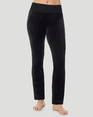 A lady wearing Stretch Velour Boot Cut Legging With Pockets in black shown in a front view pose