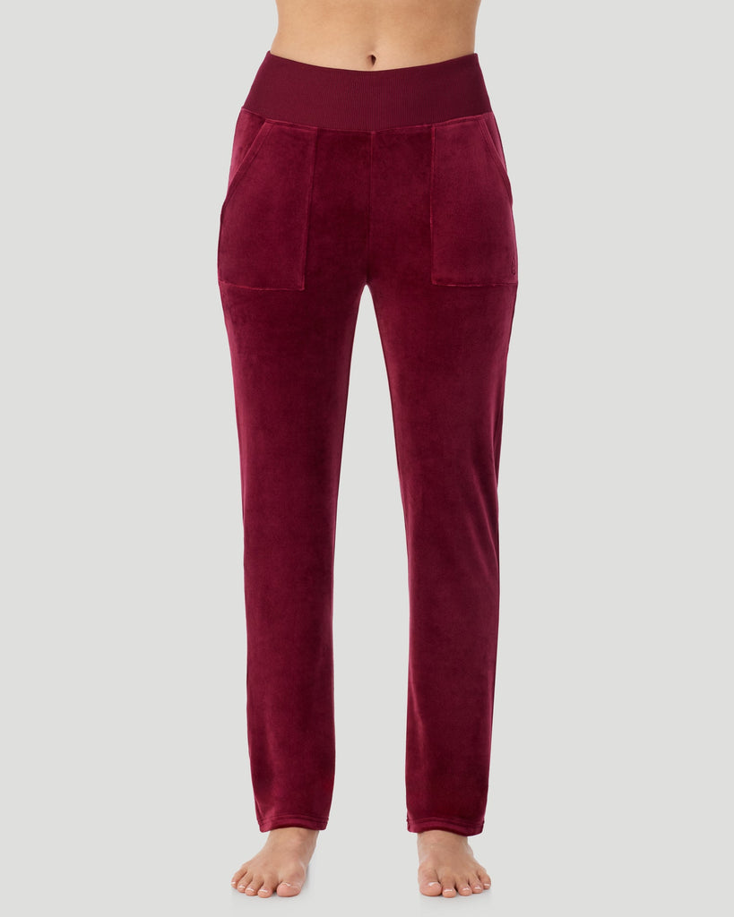 A lady wearing Stretch Velour Boot Cut Legging With Pockets in bordeaux shown in a front view pose