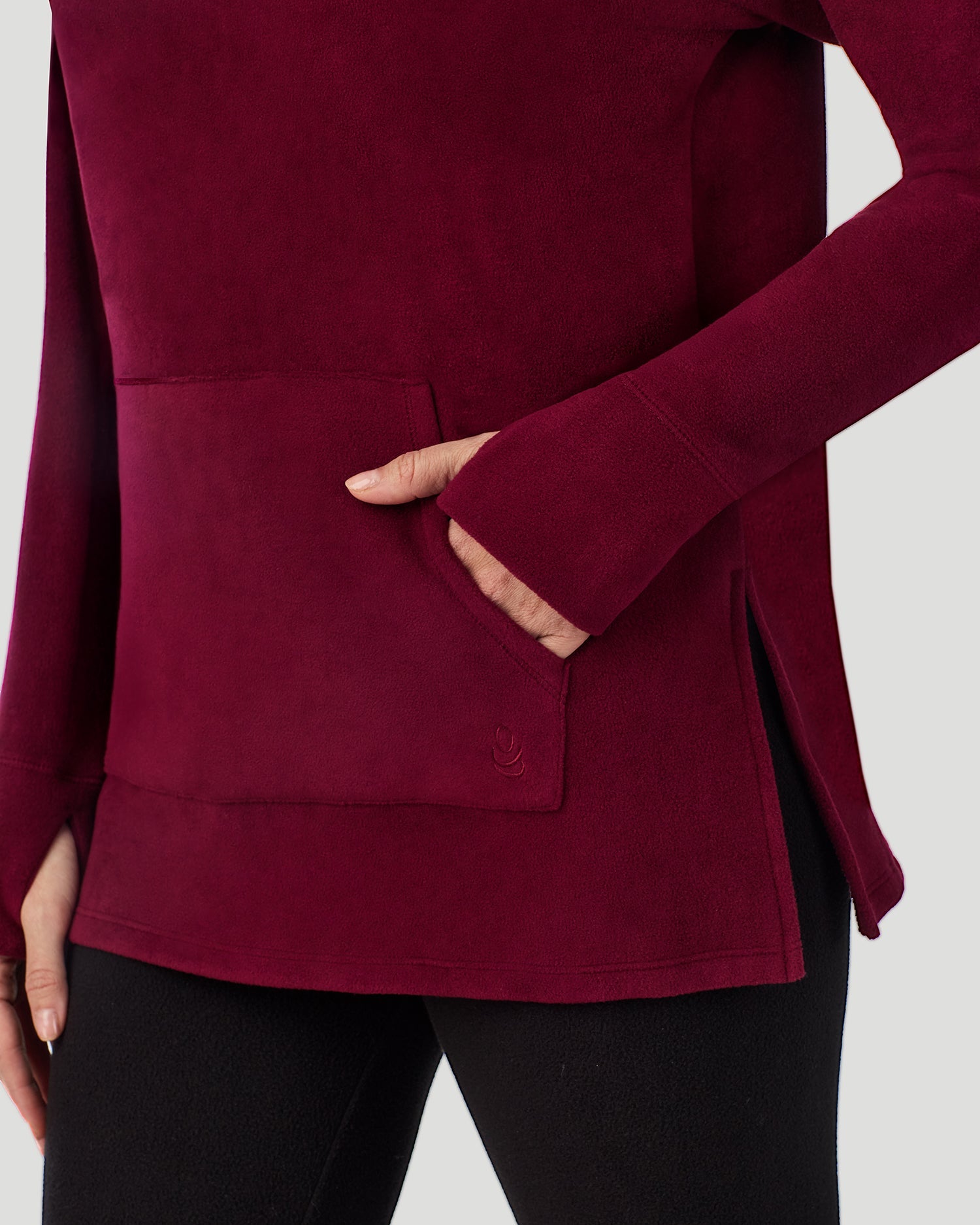 A lady wearing Fleecewear With Stretch Long Sleeve Tunic in Bordeaux