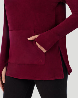  A Lady is wearing Bordeaux Fleecewear With Stretch Long Sleeve Tunic in a front view detail close up look