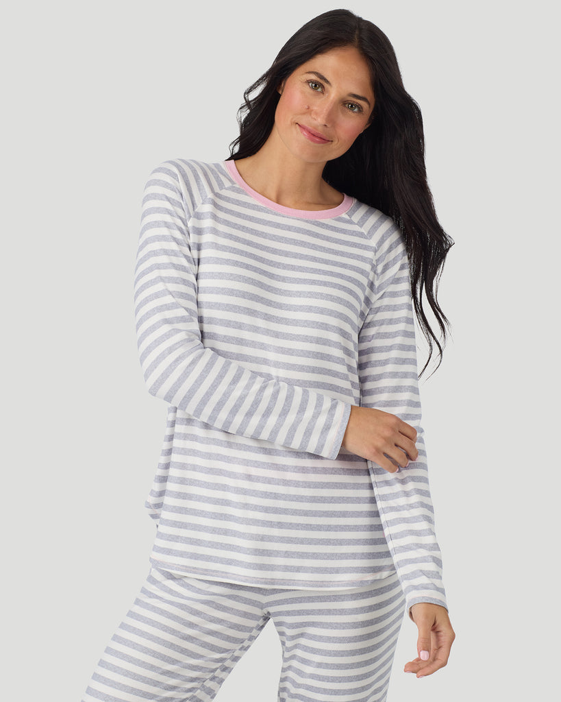  A lady wearing White + Grey Stripe Brushed Sweater Knit Long Sleeve Jogger Pajama Set in a front view closer look with a smile on her face