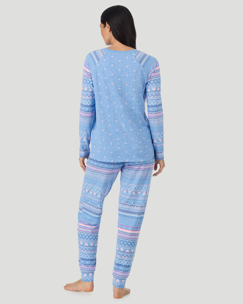  A lady wearing Peri Blue Heart Fairisle Brushed Sweater Knit Long Sleeve Jogger Pajama Set in a back view pose