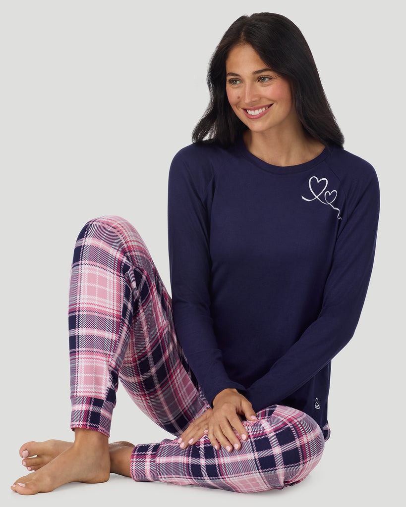  A lady wearing Heart Pink Plaid Brushed Sweater Knit Long Sleeve Jogger Pajama Set in a front view sitting pose
