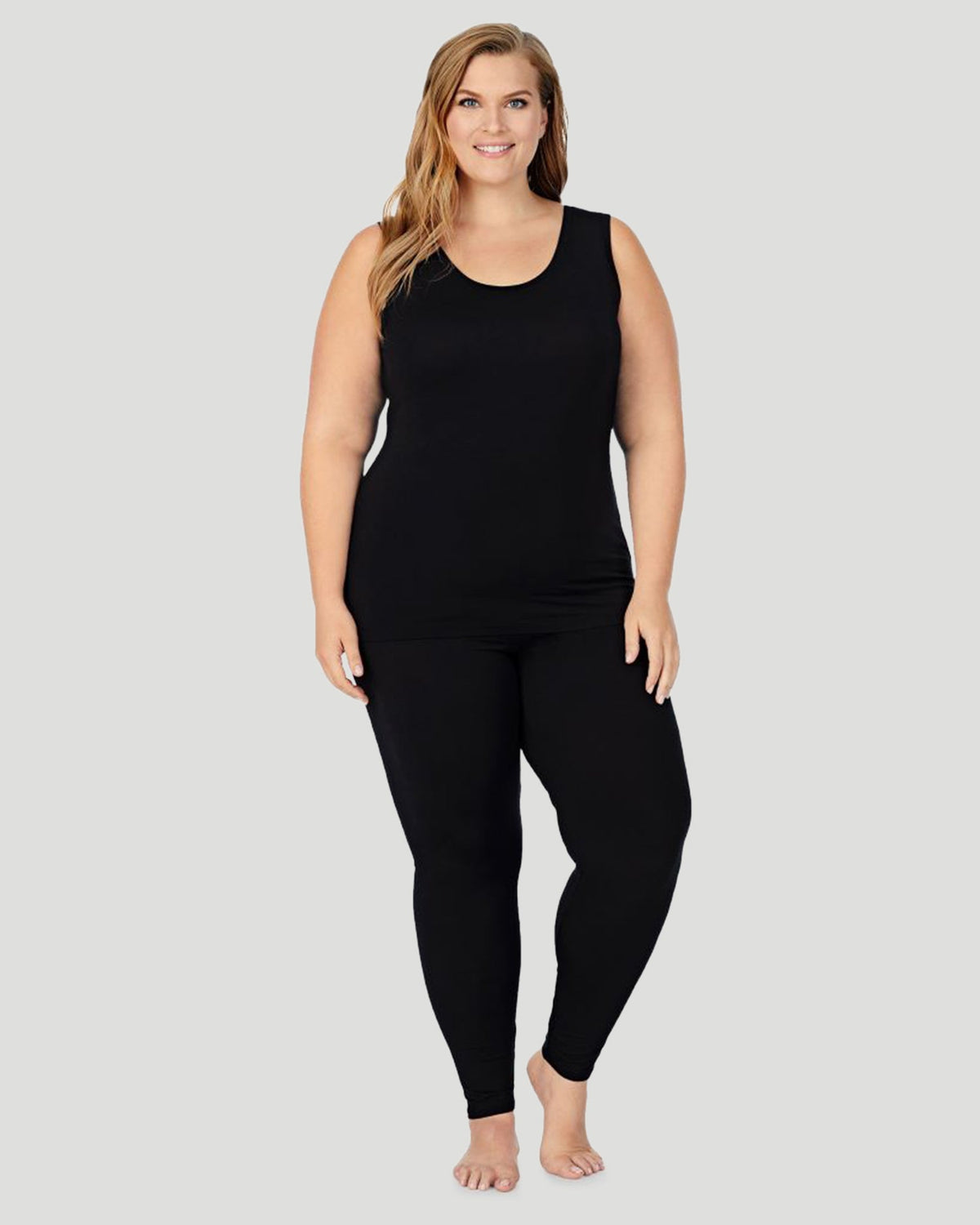 A lady wearing Softwear With Stretch Reversible Tank PLUS in Black side view side view