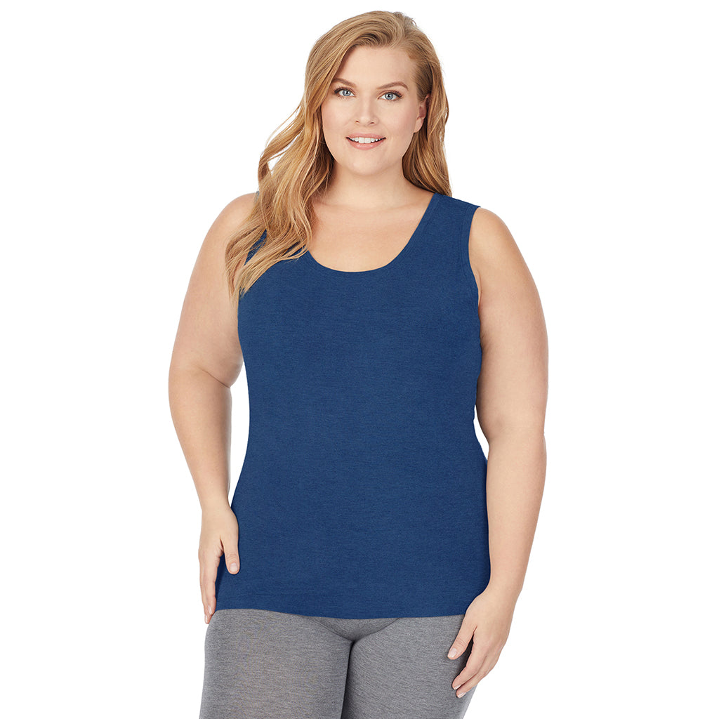 Pacific Teal; Model is wearing size 1X. She is 5'9", Bust 38", Waist 36", Hips 48.5". @A lady wearing pacific teal sleeveless reversible tank plus.