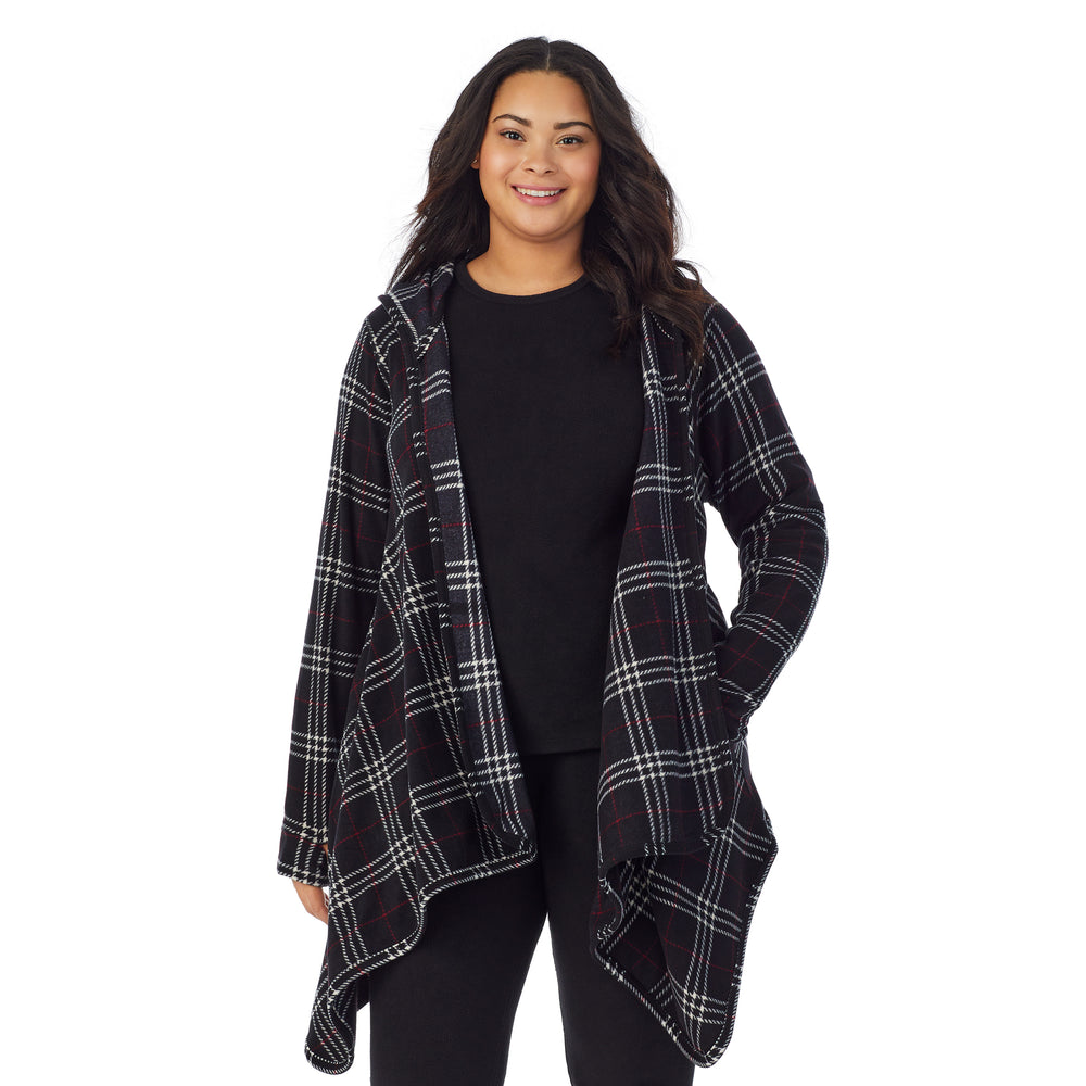 A lady wearing black plaid fleecewear with stretch long sleeve hooded wrap plus.
