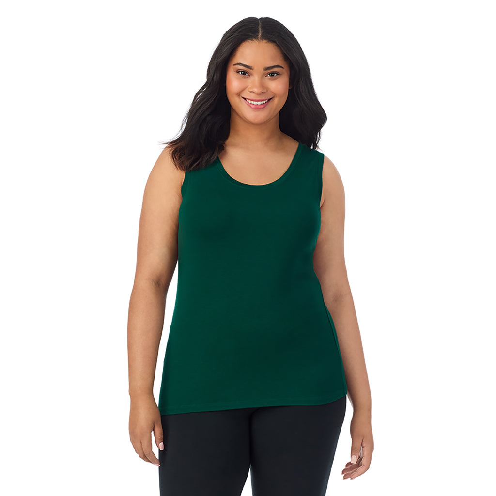 A lady wearing evergreen sleeveless reversible tank plus.