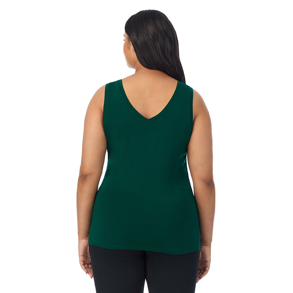 Evergreen; Model is wearing size 1X. She is 5'11", Bust 36", Waist 36.5", Hips 47.5". @A lady wearing evergreen sleeveless reversible tank plus.