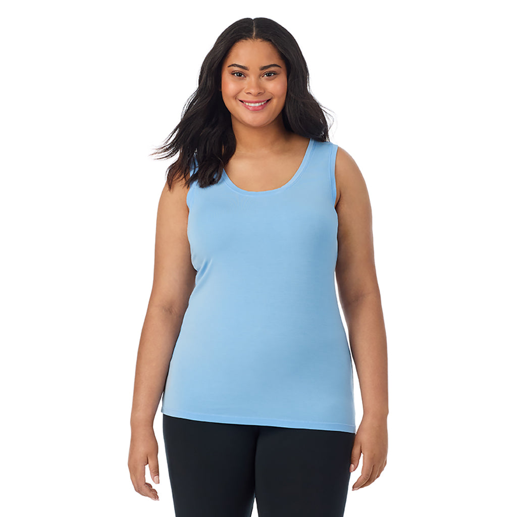 Vista Blue; Model is wearing size 1X. She is 5'11", Bust 36", Waist 36.5", Hips 47.5". @A lady wearing vista blue sleeveless reversible tank plus.