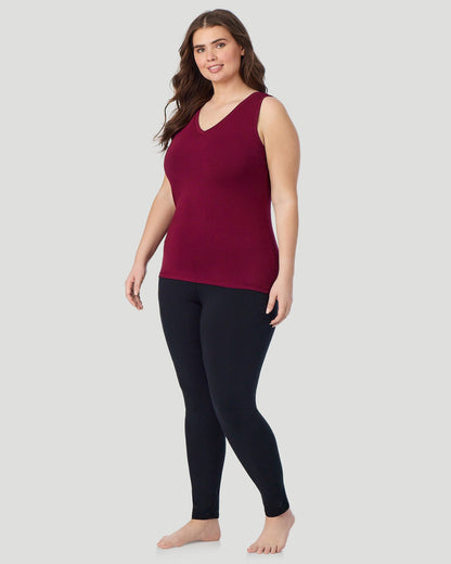  A Plus size lady wearing Scarlet Softwear With Stretch Reversible Tank PLUS facing front view standing pose