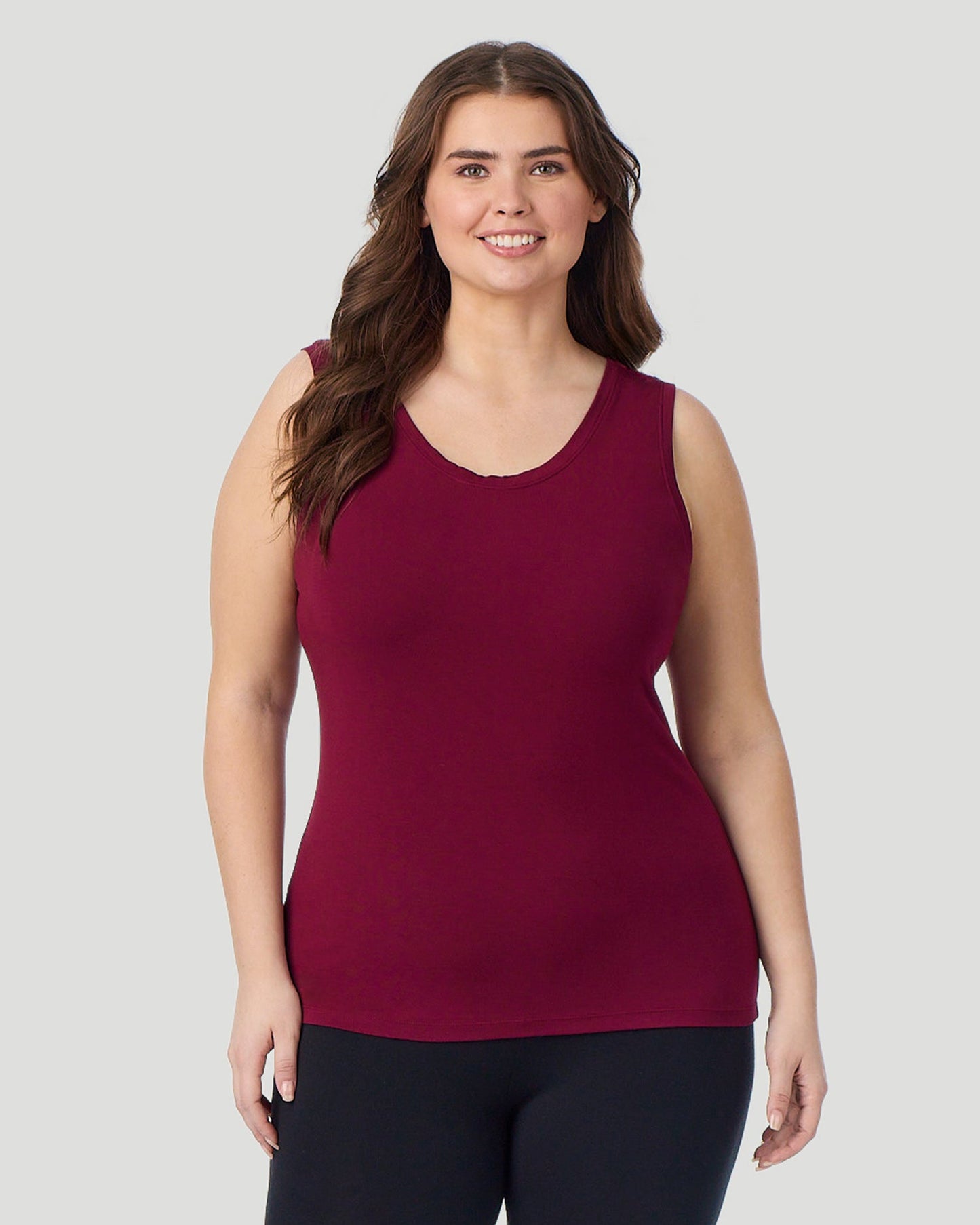 Scarlet; Model is wearing size 1X. She is 5'10", Bust 44", Waist 36", Hips 49". @ A Plus size lady wearing Scarlet Softwear With Stretch Reversible Tank PLUS facing front view