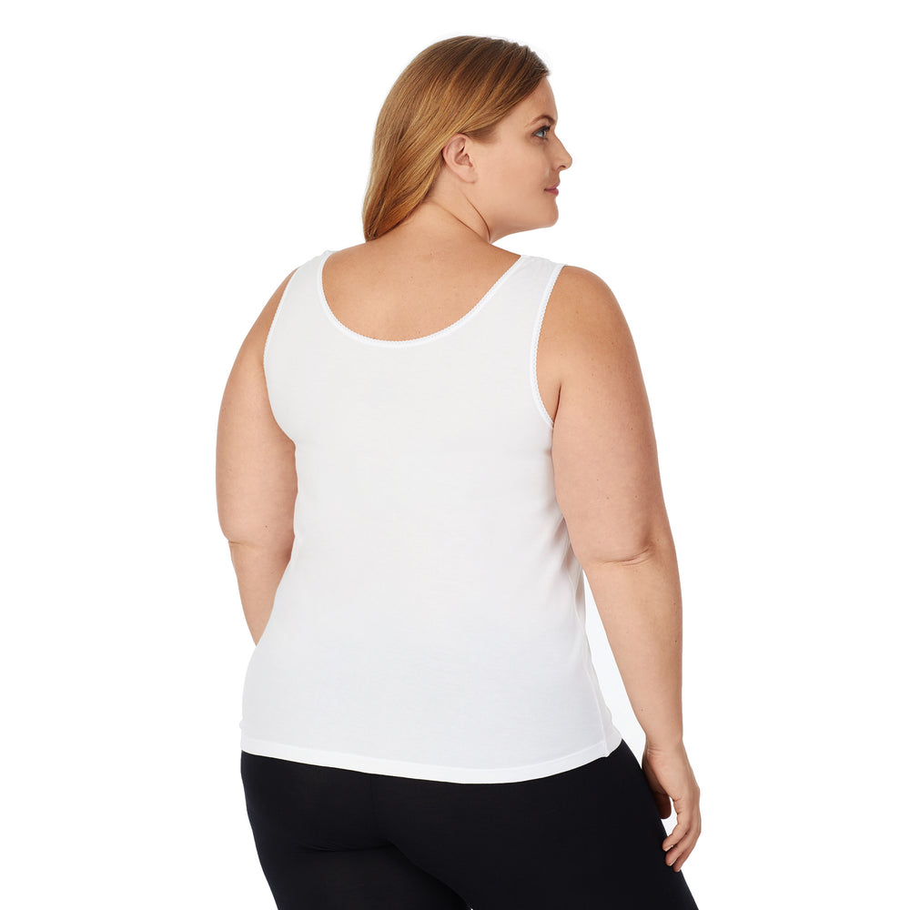 A lady wearing white lace cami