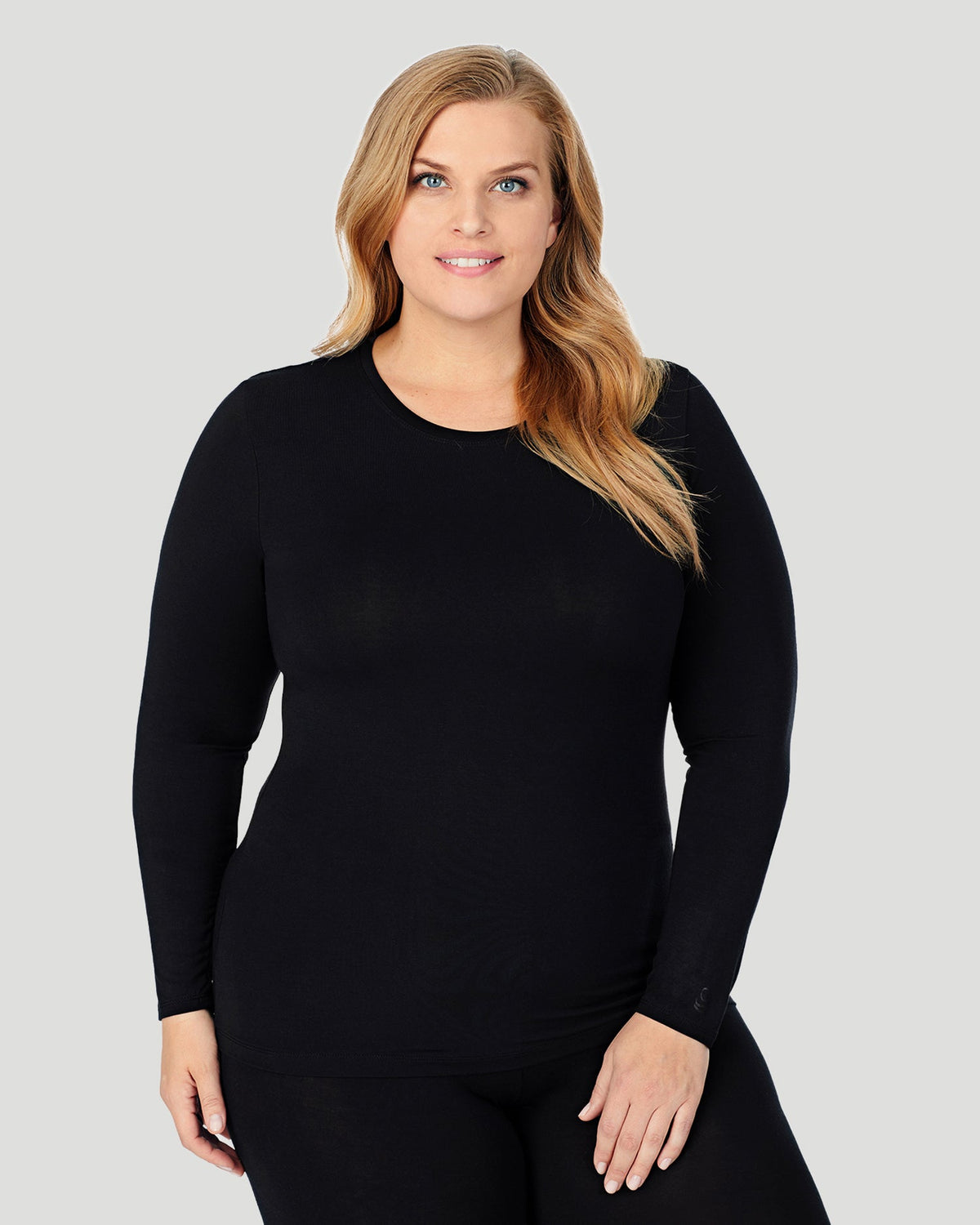 A lady wearing Softwear With Stretch Long Sleeve Crew PLUS in Black  