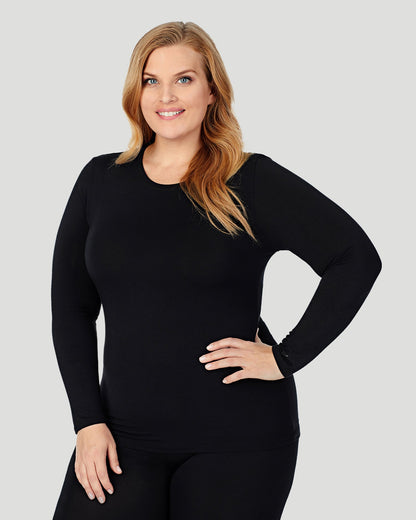 A lady wearing Softwear With Stretch Long Sleeve Crew PLUS in Black side view side view