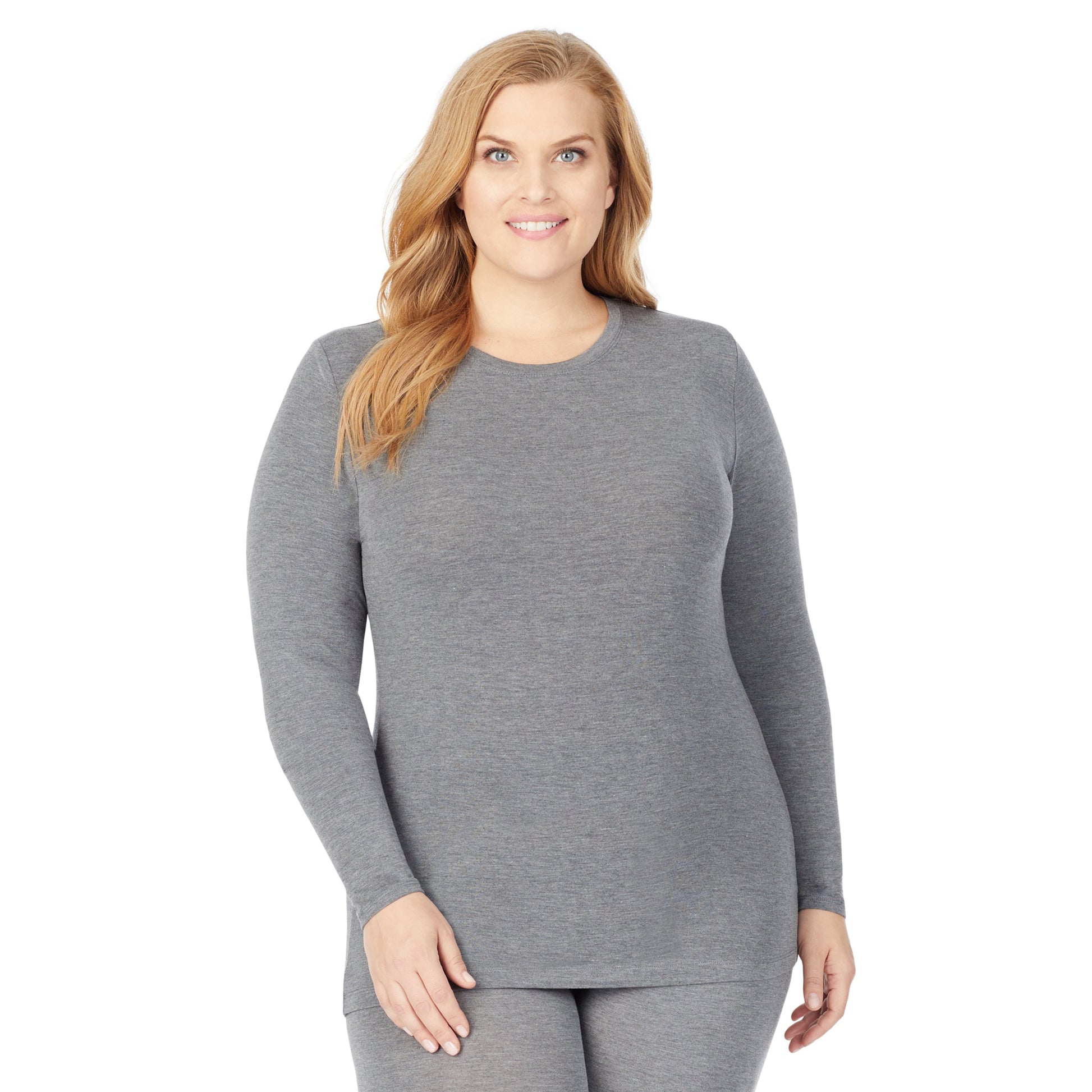 A lady wearing a charcoal heather long sleeve stretch crew plus.