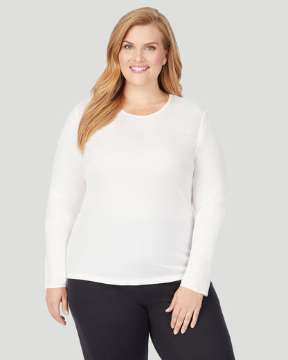 A lady wearing Softwear Long Sleeve Crew PLUS in Ivory  