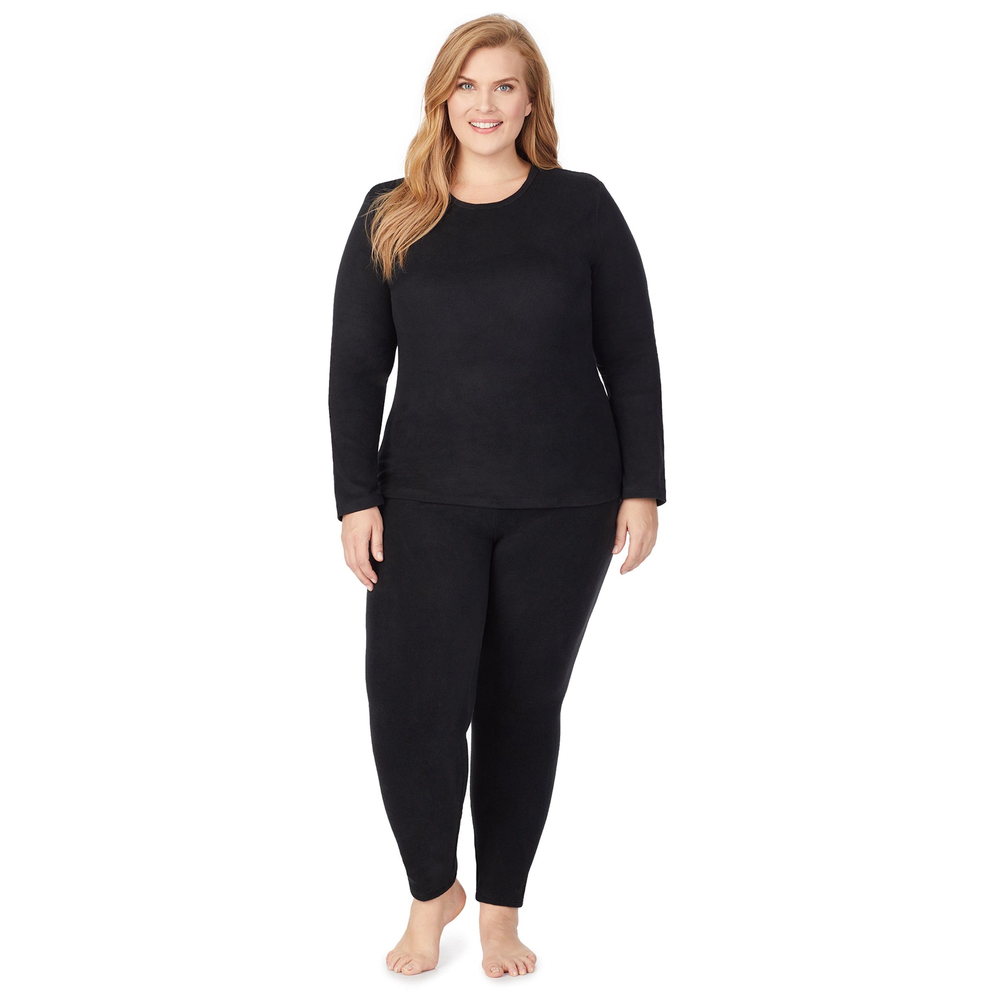 Upper body of a lady wearing black long sleeve crew