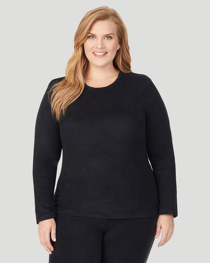 A lady wearing Fleecewear With Stretch Long Sleeve Crew PLUS in Black  