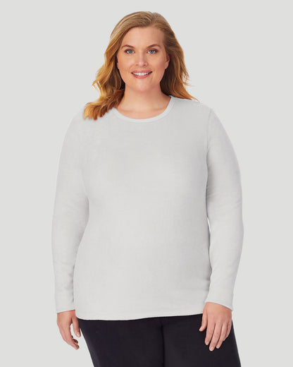 A lady wearing Fleecewear With Stretch Long Sleeve Crew PLUS in Light Grey Heather  