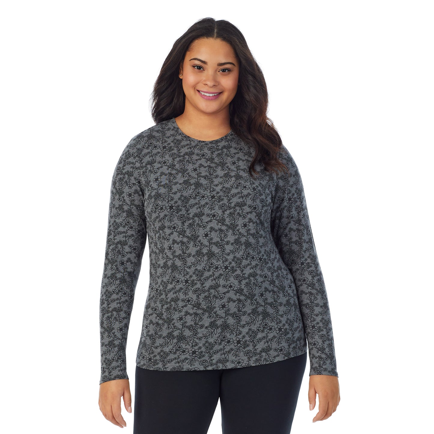Heather Grey Floral; Model is wearing size 1X. She is 5'11", Bust 36", Waist 36.5", Hips 47.5".@A lady wearing a heather grey floral long sleeve stretch crew plus.