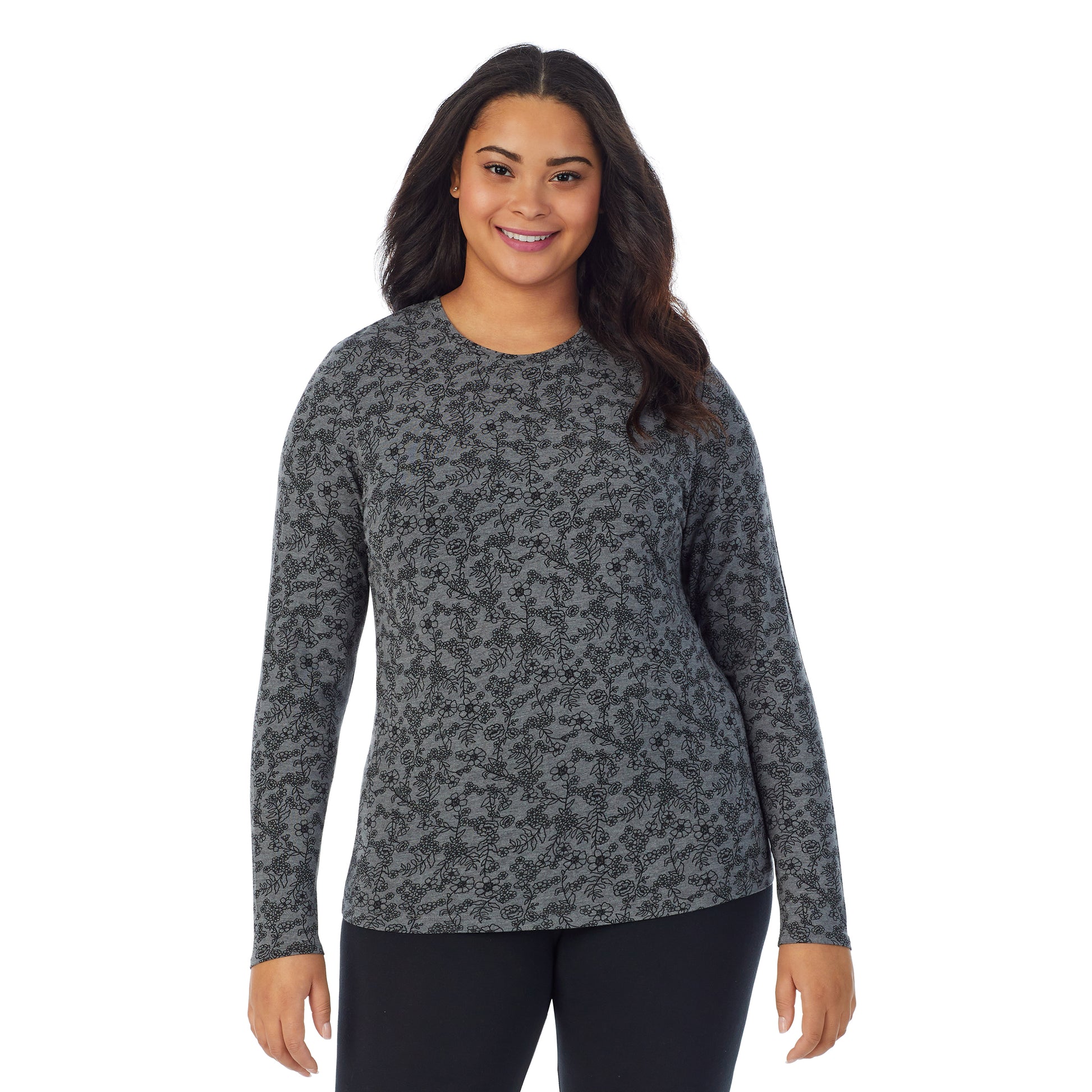 Heather Grey Floral; Model is wearing size 1X. She is 5'11", Bust 36", Waist 36.5", Hips 47.5".@A lady wearing a heather grey floral long sleeve stretch crew plus.