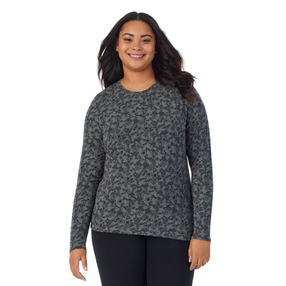 Heather Grey Floral; Model is wearing size 1X. She is 5'11", Bust 36", Waist 36.5", Hips 47.5". @A lady wearing a heather grey floral long sleeve stretch crew plus.