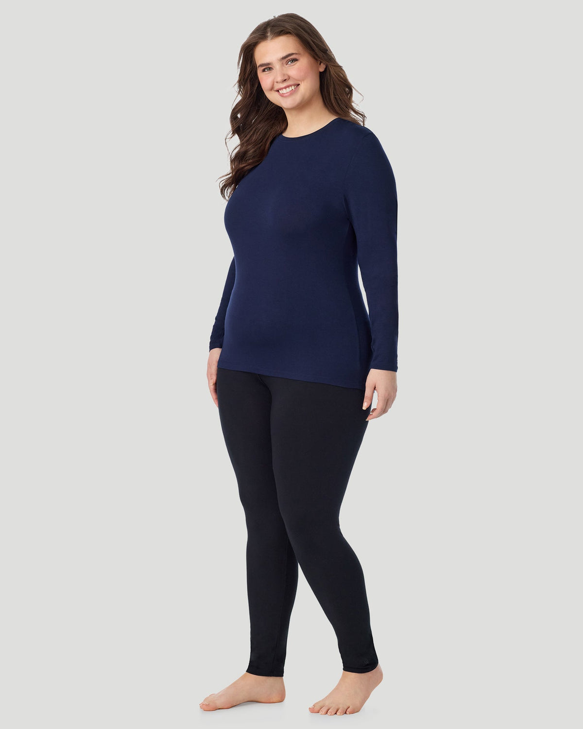 A lady wearing Softwear With Stretch Long Sleeve Crew PLUS in Navy Blazer side view side view