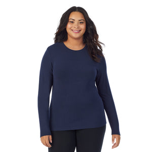 A lady wearing Softwear With Stretch Long Sleeve Crew PLUS in Navy Blazer back view back view