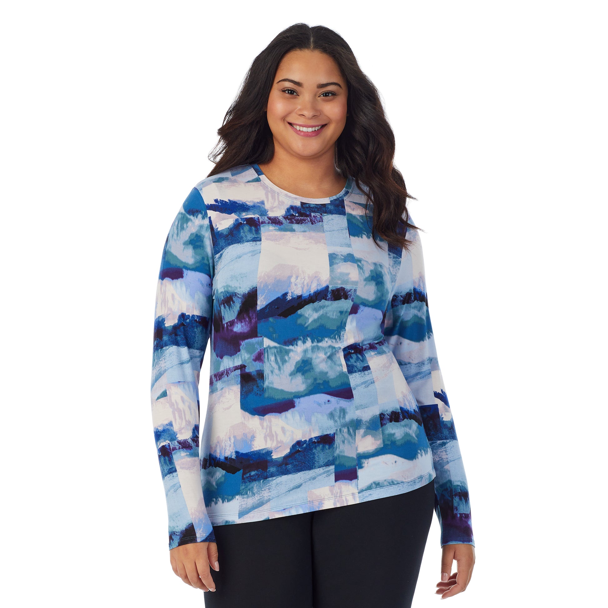 Blue Scenic;Model is wearing size 1X. She is 5'11", Bust 36", Waist 36.5", Hips 47.5".@A lady wearing a Blue Scenic long sleeve stretch crew plus.