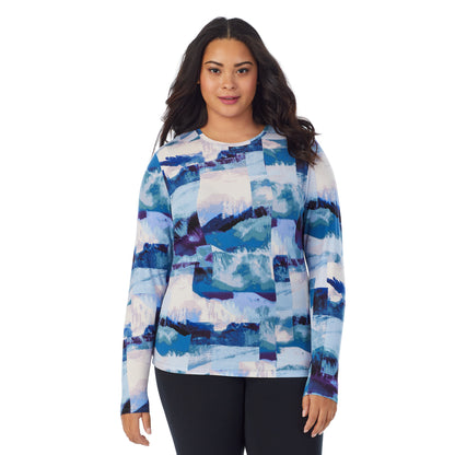 Blue Scenic;Model is wearing size 1X. She is 5'11", Bust 36", Waist 36.5", Hips 47.5". @A lady wearing a Blue Scenic long sleeve stretch crew plus.