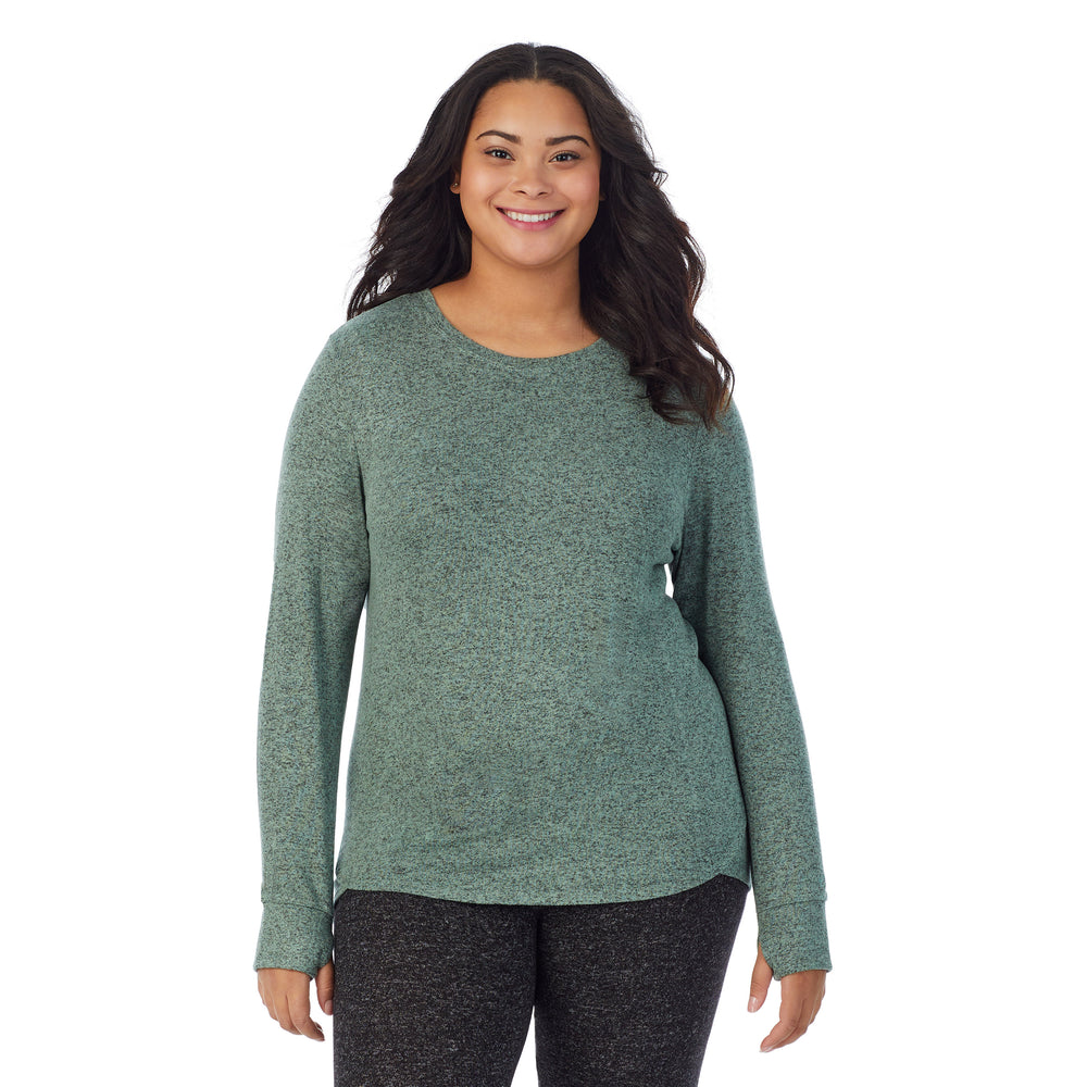 A lady wearing a Marled Soft Olive long sleeve crew plus.
