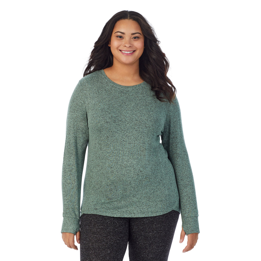 A lady wearing a Marled Soft Olive long sleeve crew plus.