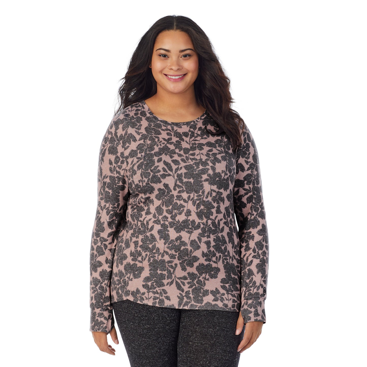 Mauve Floral; Model is wearing size 1X. She is 5’11”, Bust 36”, Waist 36.5”, Hips 47.5”. @A lady wearing a Mauve Floral long sleeve crew plus.