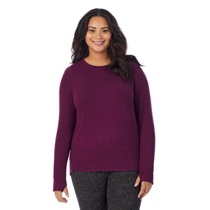 A lady wearing a Marled Purple Beet long sleeve crew plus.