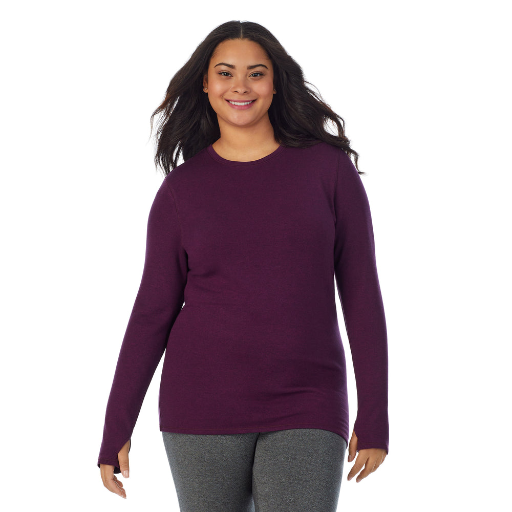 A lady wearing purple beet heather Ultra Cozy Long Sleeve Crew PLUS