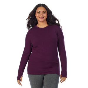  A lady wearing purple beet heather Ultra Cozy Long Sleeve Crew PLUS