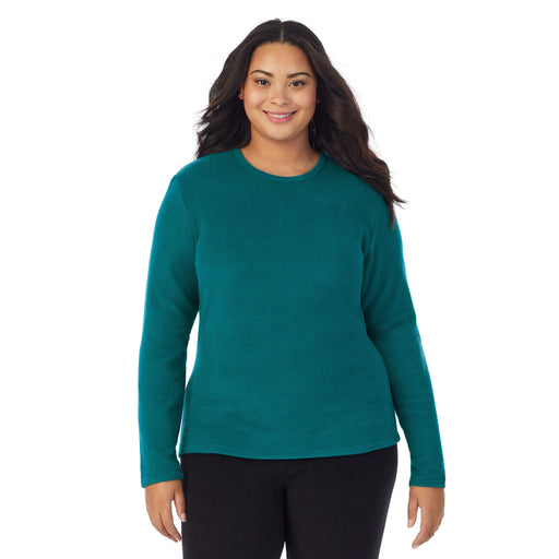 Teal Lagoon;Model is wearing size 1X. She is 5’11”, Bust 36”, Waist 36.5”, Hips 47.5”.@A lady wearing teal lagoon fleecewear with stretch long sleeve crew plus.
